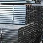 ร้านขายเหล็กกล่องแบน ท่อเหล็กแบน (RHS) เหล็กรูปพรรณกลวง พร้อมจัดส่ง Rectangular hollow section (RHS) steel supply flat steel tube stack for industrial use