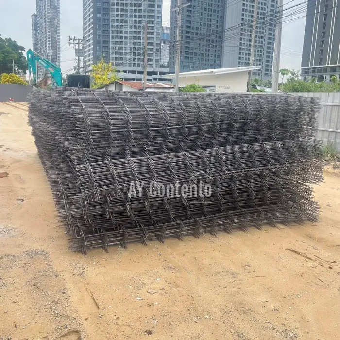 6mm ribbed wire mesh, panel type, 20x20 specification, delivered to a job site in Pathum Thani.